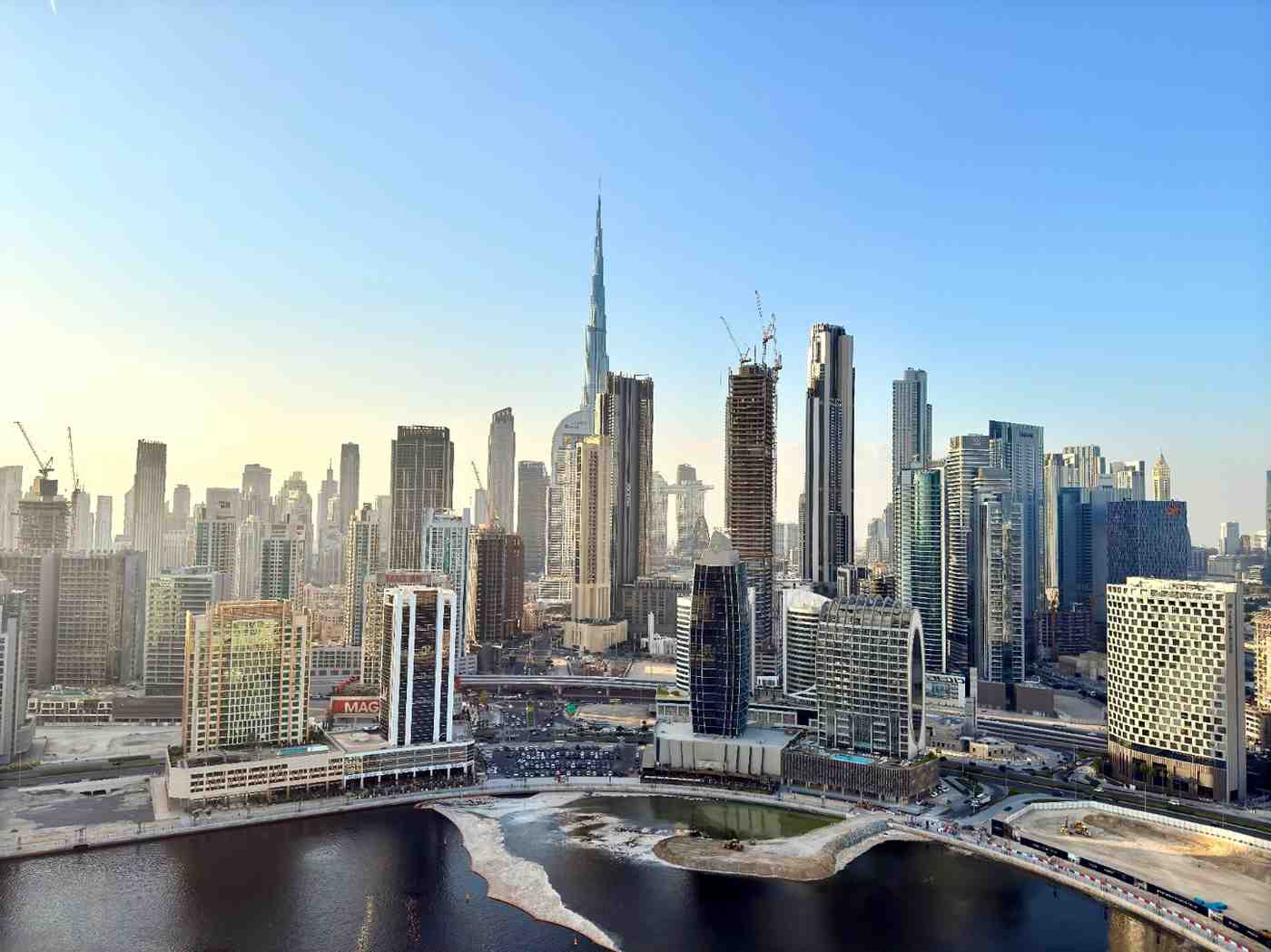 Predictive analytics dashboard forecasting Dubai real estate market trends and property price movements for investors